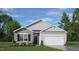 Craftsman style home with stone accents and a two-car garage at 40 Saddle Mare St, Clayton, NC 27520