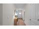 Hallway with a view into living room and access to laundry at 40 Saddle Mare St, Clayton, NC 27520