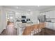 Island kitchen with stainless steel appliances and granite countertops at 40 Saddle Mare St, Clayton, NC 27520