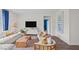 Cozy living room with sectional sofa and wood coffee table at 40 Saddle Mare St, Clayton, NC 27520