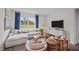 Relaxing living room with comfortable seating and large window at 40 Saddle Mare St, Clayton, NC 27520