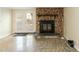Stone fireplace and French doors in finished basement at 5829 Sandstone Dr, Durham, NC 27713
