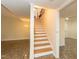 Basement stairs leading to finished lower level at 5829 Sandstone Dr, Durham, NC 27713