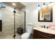 Bathroom with updated vanity and a walk-in shower at 5829 Sandstone Dr, Durham, NC 27713