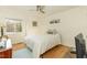 Bedroom with a full bed, ceiling fan, and hardwood floors at 5829 Sandstone Dr, Durham, NC 27713