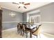 Bright dining room with a charming window and wood table at 5829 Sandstone Dr, Durham, NC 27713