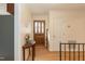 Bright entryway with hardwood floors and coat closet at 5829 Sandstone Dr, Durham, NC 27713