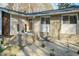 Brick front entry with decorative planters and landscaping at 5829 Sandstone Dr, Durham, NC 27713