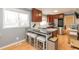 Eat-in kitchen featuring stainless steel appliances and a breakfast bar at 5829 Sandstone Dr, Durham, NC 27713