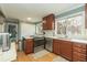 Modern kitchen with stainless steel appliances and granite countertops at 5829 Sandstone Dr, Durham, NC 27713