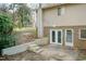 Concrete patio with exterior basement access at 5829 Sandstone Dr, Durham, NC 27713