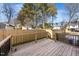 Wooden deck overlooks fenced backyard at 2503 Lednum St, Durham, NC 27704