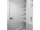 Bathroom with built-in shelving and hexagon tile floor at 2503 Lednum St, Durham, NC 27704