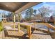 Spacious front porch with wooden railings and street view at 2503 Lednum St, Durham, NC 27704