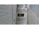 Covered front porch entrance with wood flooring and siding at 332 Bass Lake Road Rd, Holly Springs, NC 27540