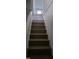 Wooden staircase leading to the upper floor at 332 Bass Lake Road Rd, Holly Springs, NC 27540