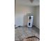 Utility room with water heater and tile flooring at 332 Bass Lake Road Rd, Holly Springs, NC 27540