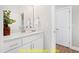 Bathroom with vanity and access to laundry at 117 Deer Cross Dr, Louisburg, NC 27549