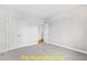 Bedroom with double doors leading to another room at 117 Deer Cross Dr, Louisburg, NC 27549