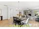 Dining room features a chandelier and hardwood floors at 117 Deer Cross Dr, Louisburg, NC 27549