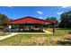 Covered outdoor fitness park with various exercise equipment at 117 Deer Cross Dr, Louisburg, NC 27549