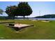 Community horseshoe pits by the lake at 117 Deer Cross Dr, Louisburg, NC 27549