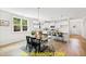 Open concept kitchen with island and white cabinets at 117 Deer Cross Dr, Louisburg, NC 27549