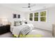 Spacious bedroom with large windows and ceiling fan at 117 Deer Cross Dr, Louisburg, NC 27549