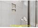 Shower stall with built-in shelves and seat at 117 Deer Cross Dr, Louisburg, NC 27549
