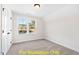 Cozy bedroom with window and closet at 212 Rawhide Dr, Louisburg, NC 27549