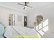 Well-lit bedroom with access to another room and plenty of natural light at 212 Rawhide Dr, Louisburg, NC 27549