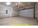 Spacious garage with overhead door and ample space at 212 Rawhide Dr, Louisburg, NC 27549