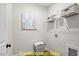 Laundry room with shelving and space for storage at 212 Rawhide Dr, Louisburg, NC 27549