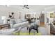 Open concept living space showcasing a kitchen and staircase at 212 Rawhide Dr, Louisburg, NC 27549