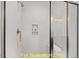 Clean shower with built-in shelving and a glass enclosure at 212 Rawhide Dr, Louisburg, NC 27549