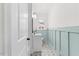 Updated bathroom with subway tile and patterned floor at 303 Forest Rd, Oxford, NC 27565