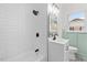 Updated bathroom with subway tile shower and vanity at 303 Forest Rd, Oxford, NC 27565