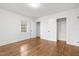 Hardwood floor bedroom with spacious closet and window at 303 Forest Rd, Oxford, NC 27565