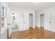 Bright bedroom with hardwood floors and spacious closets at 303 Forest Rd, Oxford, NC 27565