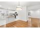 Modern white kitchen with stainless steel appliances and island at 303 Forest Rd, Oxford, NC 27565