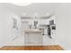 Modern kitchen with white cabinets and granite countertops at 303 Forest Rd, Oxford, NC 27565