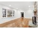 Bright living room with hardwood floors and large windows at 303 Forest Rd, Oxford, NC 27565