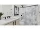 Clean bathroom with shower/tub combo, vanity, and updated fixtures at 4041 Elk Creek Ln # 16, Raleigh, NC 27612