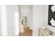 Hallway with view into kitchen and dining area at 4041 Elk Creek Ln # 16, Raleigh, NC 27612
