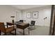 Spacious home office with a large desk and plenty of natural light at 4041 Elk Creek Ln # 16, Raleigh, NC 27612