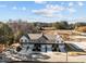 Aerial view of three-unit townhome building with parking at 507 Excelsior Ct, Rolesville, NC 27587