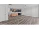 Open concept living room, kitchen, and hardwood floors at 507 Excelsior Ct, Rolesville, NC 27587