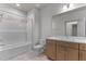 Clean bathroom with tub, toilet and wood vanity at 509 Excelsior Ct, Rolesville, NC 27587