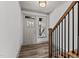 Bright entryway with hardwood floors and staircase at 509 Excelsior Ct, Rolesville, NC 27587