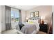 Cozy bedroom with a double bed and large window at 60 Fair Child Rd, Spring Lake, NC 28390